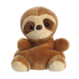 Aurora Palm Pals Slomo Sloth plush — a two-toned brown sloth soft toy with a cream facial disc, dark brown eye patches, a small black nose, and one arm raised in a relaxed waving pose