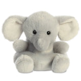 Aurora Palm Pals Stomps Elephant plush — a soft grey elephant soft toy with large floppy cream-lined ears, a short trunk, and a rounded seated pose against a white background
