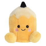 Aurora Palm Pals Tike Pencil plush — a yellow pencil-shaped soft toy with a cream and black tip, pink blush cheeks, a smiling face, and rounded yellow feet
