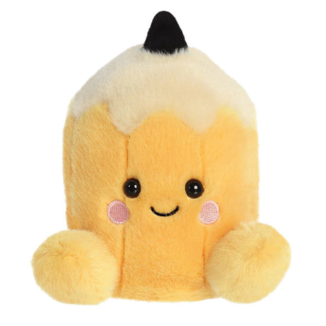 Aurora Palm Pals Tike Pencil plush — a yellow pencil-shaped soft toy with a cream and black tip, pink blush cheeks, a smiling face, and rounded yellow feet