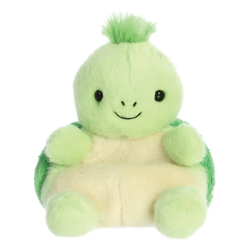 Palm Pals Tiny Turtle plush, a small palm-sized stuffed turtle with a light green rounded body, a spiky green tuft of hair on top, a cream belly, and a cheerful embroidered smile