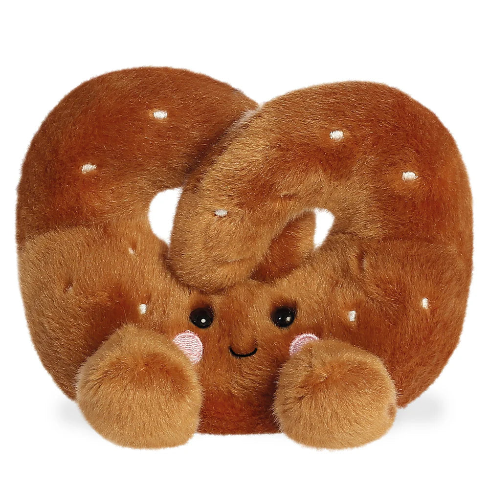 Plush toy shaped like a pretzel on a white background