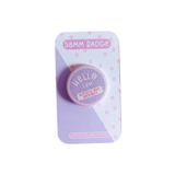 Peachy Lane Studio Hello I Am Autistic and Anxious 38mm badge, lilac, white background