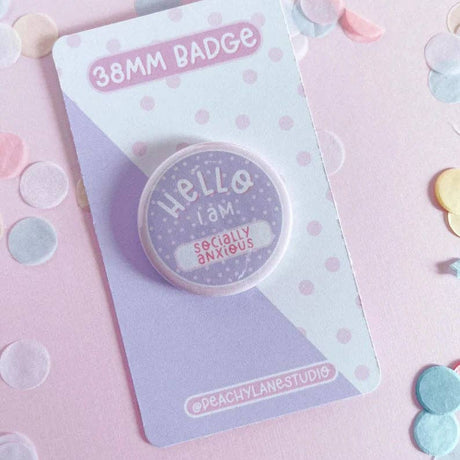 Peachy Lane Studio Hello I Am Socially Anxious 38mm badge, lilac, confetti background