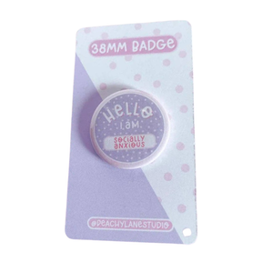 Peachy Lane Studio Hello I Am Socially Anxious 38mm badge, lilac, white background