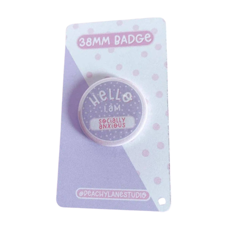 Peachy Lane Studio Hello I Am Socially Anxious 38mm badge, lilac, white background