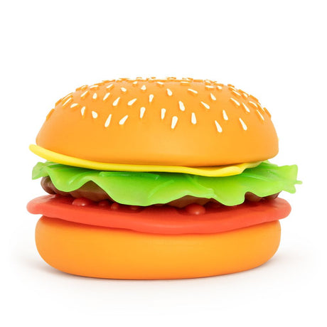 Fully assembled Peel N Stack Burger sand-filled sensory toy showing all layers stacked — sesame bun, cheese, lettuce, tomato and patty