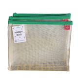 Two Petra Boase pale mesh handy bags with green zip stacked together showing Handy Bag tag, front view