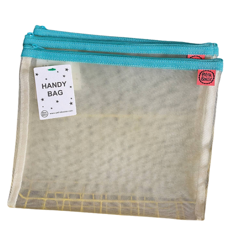 Petra Boase pale mesh handy bag with teal zip shown flat against white background with Handy Bag tag