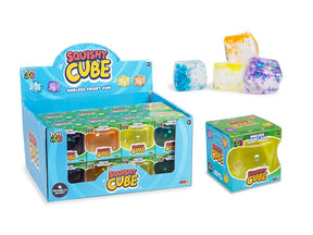 Play Hub Squishy Cube display box beside individual boxed cubes and four loose glitter cubes