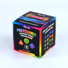 A 3D-rendered or photographed cube-shaped product box for 'Polysquish Discovery Series' by 'Cub65', shown on a plain light gray/white background. The box is mostly black with rainbow gradient edges and colorful printed graphics including geometric shapes and text such as 'Collect Them All' and 'Squish & Squeeze & Discover.