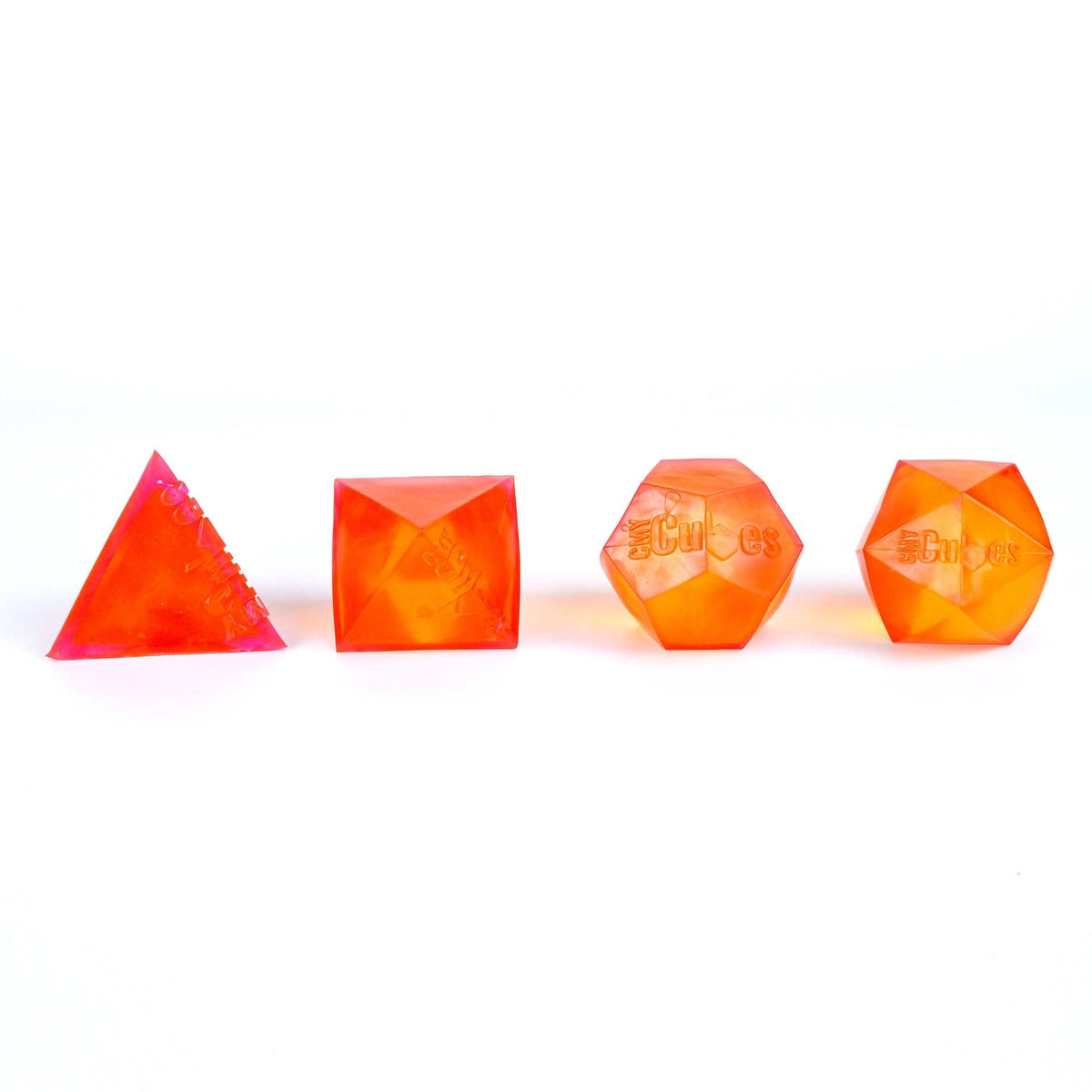 Set of four geometric-shaped orange squishies on a white background