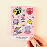 Close-up of the Positivity Sticker Sheet showing kawaii bee, heart, flower, planet, star, rainbow and crystal ball stickers with affirmation messages
