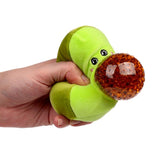 Hand squeezing a green plush avocado sensory toy causing the water bead pit to bulge out