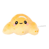 Queasy Squeezies Foodiemals croissant kawaii plush squeezy toy, happy face