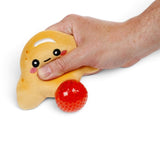 Squeezing Queasy Squeezies croissant plush - red bead stress ball pops out