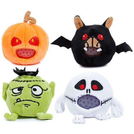 Four Queasy Squeezies Halloween plush squeeze toys in pumpkin, bat, Frankenstein and ghost designs on a white background
