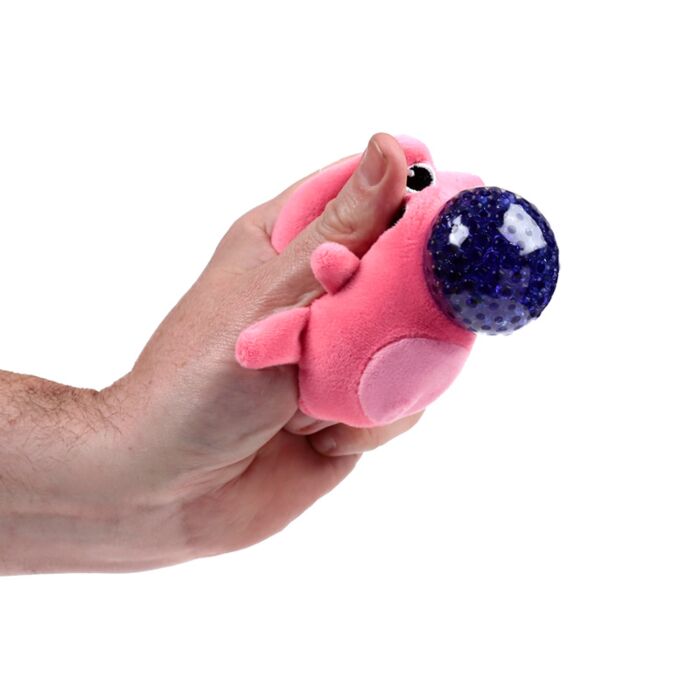 Hand squeezing a pink four-eyed alien Queasy Squeezie causing a dark purple water bead to bulge from its mouth