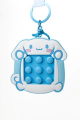 Front of Sanrio Cinnamoroll fidget keychain showing blue bubble pop fidget pad