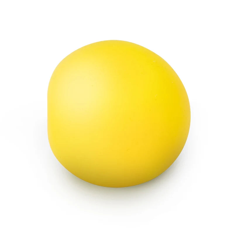 Yellow Scrunchems Colour Change Squish Ball sensory stress toy before being squeezed