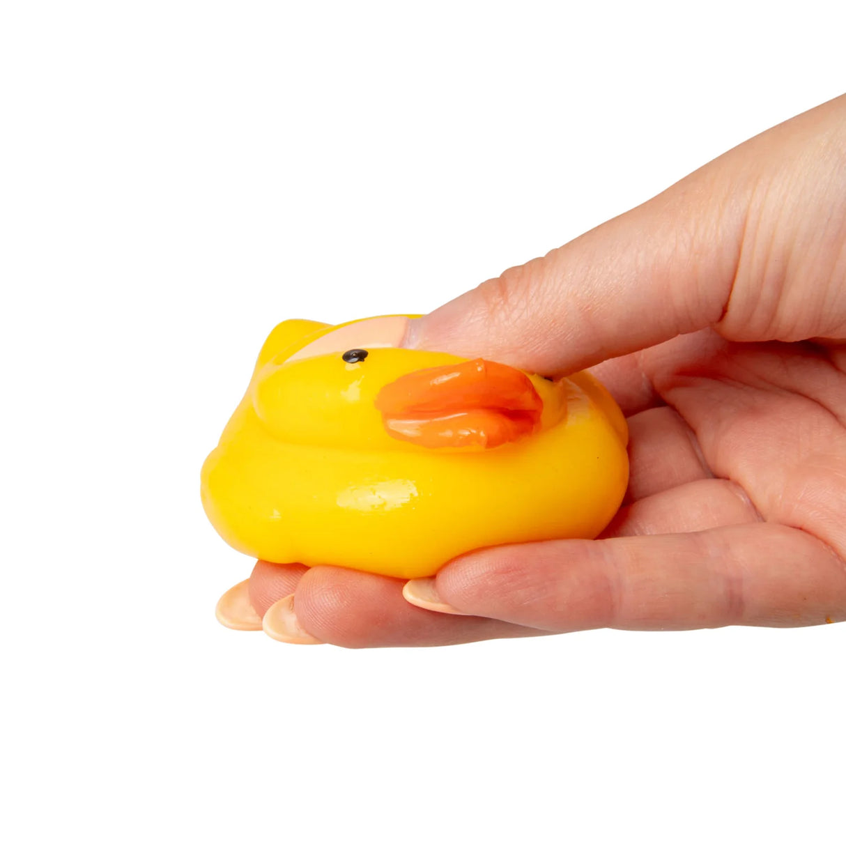 Hand squeezing and deforming the yellow Scrunchems duck squishy from the side