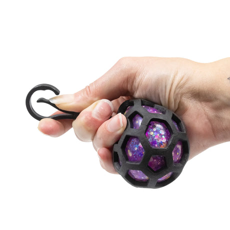 Glitter scrunchems fusion squish ball keychain inside black mesh showing colourful gel texture