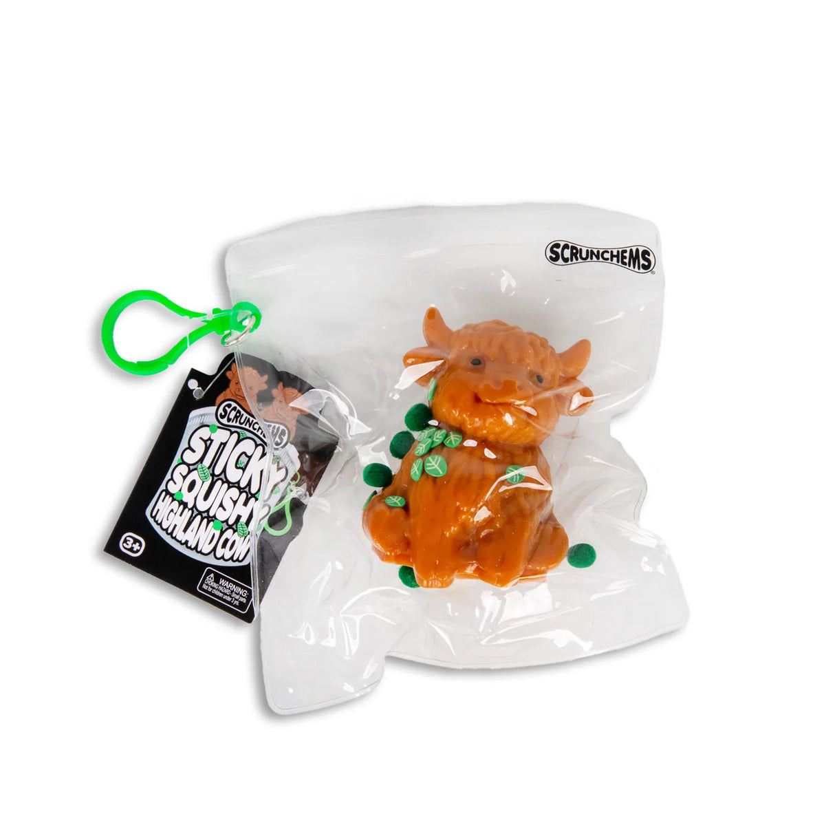 Scrunchems Highland Cow squishy in bag with green clip and branded tag showing product name