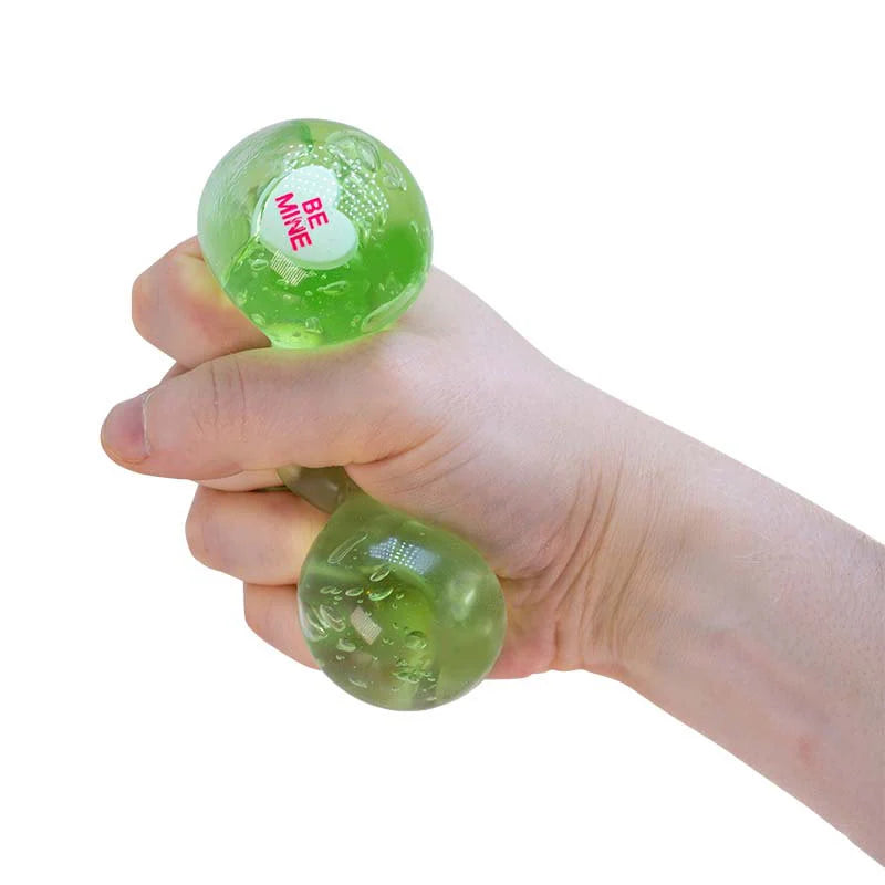 Green Scrunchems Kind Heart Squish Bear being squeezed to reveal Be Mine heart message