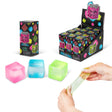 Scrunchems Mini Sugar Cubes box and display with a green squishy cube being stretched