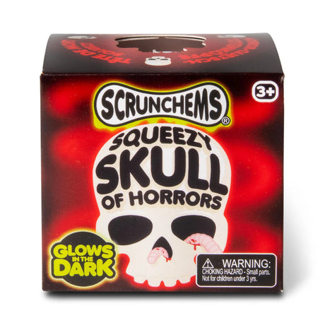 Front of Scrunchems Squeezy Skull of Horrors box with glow-in-the-dark branding and skull illustration