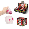Scrunchems Squeezy Skull of Horrors displayed with box and action squeeze shot showing the glow-in-the-dark skull and its grim pink filling