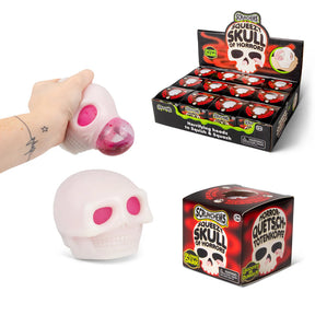 Scrunchems Squeezy Skull of Horrors displayed with box and action squeeze shot showing the glow-in-the-dark skull and its grim pink filling