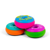 Three squishy donut fidget toys in teal-orange, blue-pink and pink-green colourways stacked together