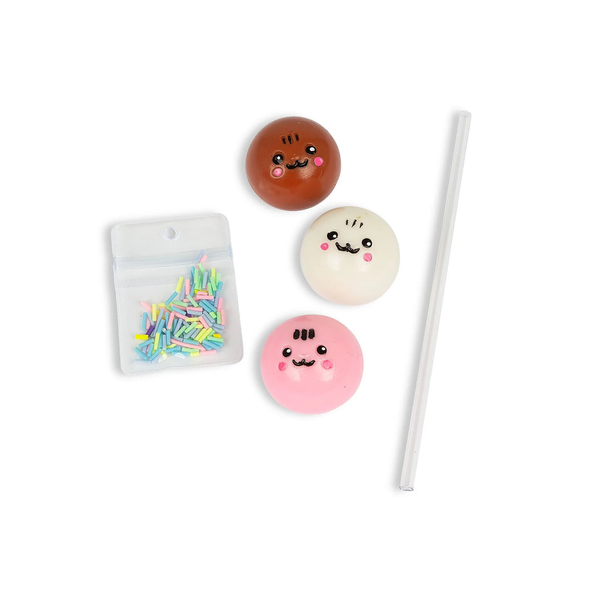 Scrunchems Sticky Squishy Cake Pop contents with three squishy faces, sprinkles bag and stick