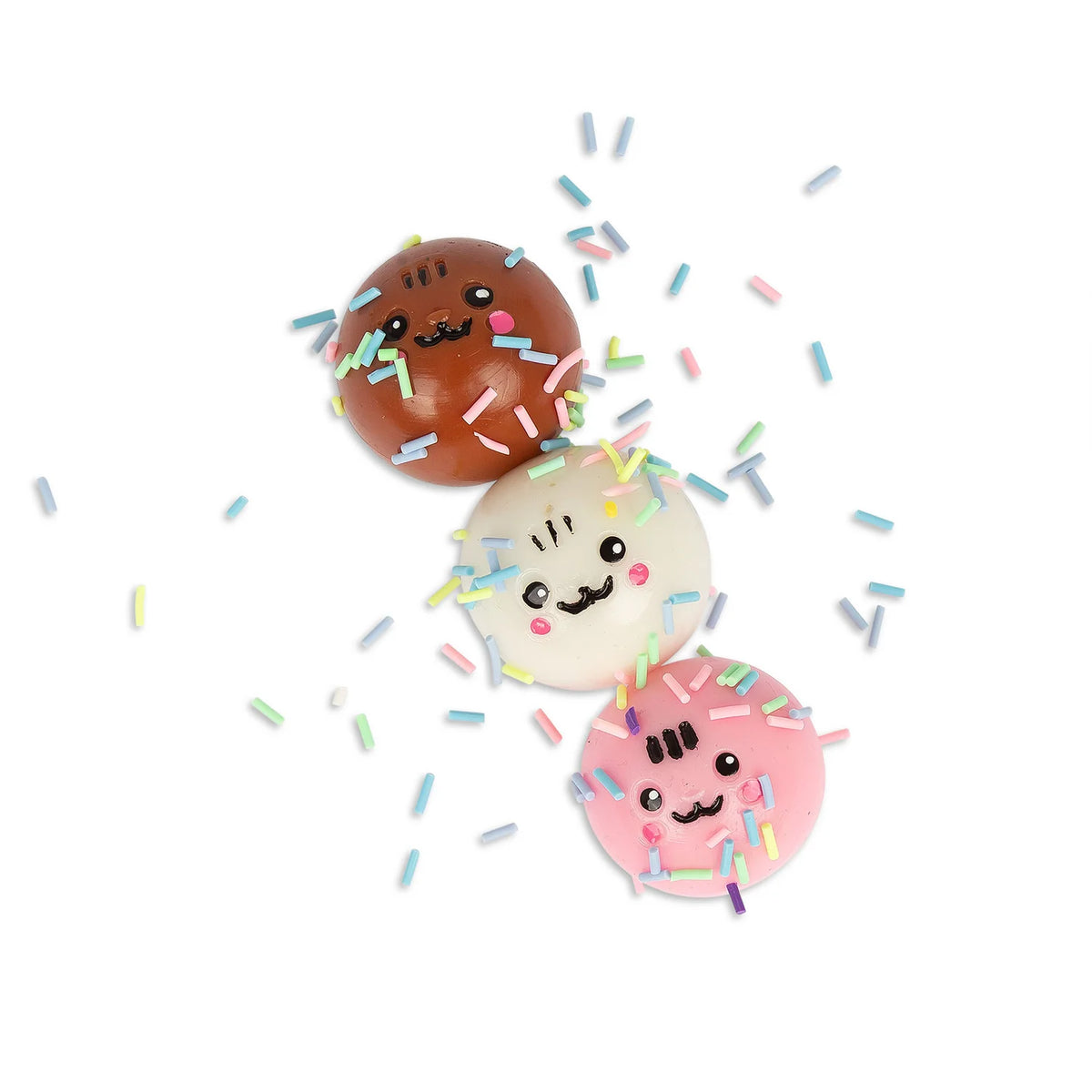 Three Scrunchems sticky squishy cake pop faces in chocolate, vanilla and pink with sprinkles