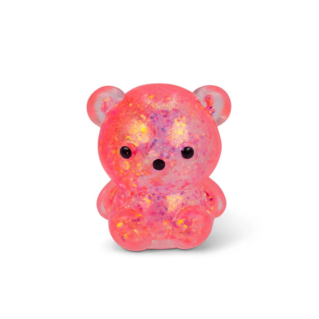 Pink holographic glitter Scrunchems Sugar Squishy Bear with kawaii face isolated on white background