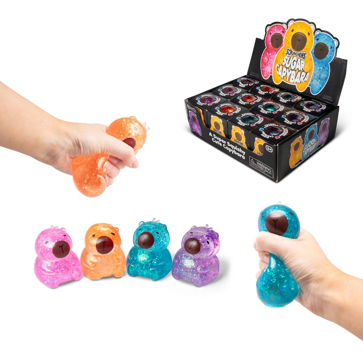 Four glitter Scrunchems Sugar Capybara squishies in pink, orange, teal and purple shown with hands squeezing and retail display box
