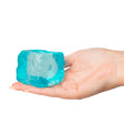Blue Scrunchems Textured Sugar Cube resting on an open palm