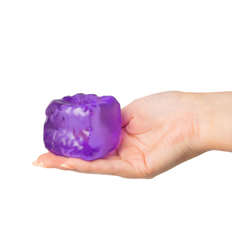 Purple Scrunchems Textured Sugar Cube resting on an open palm