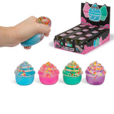 Scrunchems Sugar Cupcake display box beside four assorted colourway squishy toys