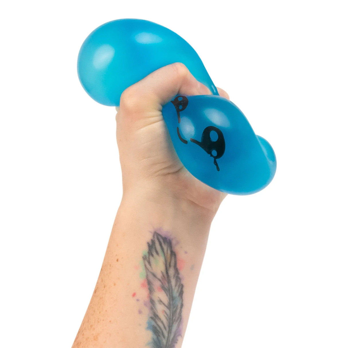 Blue Scrunchems Sugar Dumpling squeezed in hand, squishy sensory fidget toy
