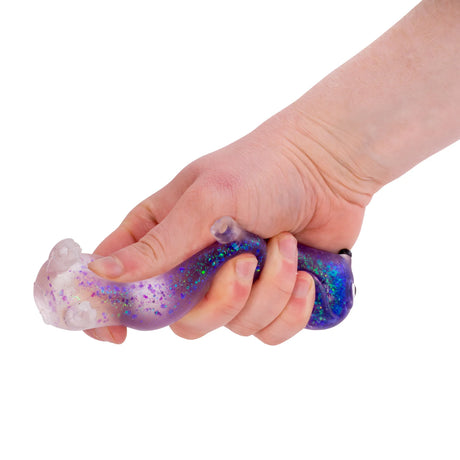 Purple Scrunchems Sugar Sausage Dog glitter stretchy sensory toy squeezed in hand