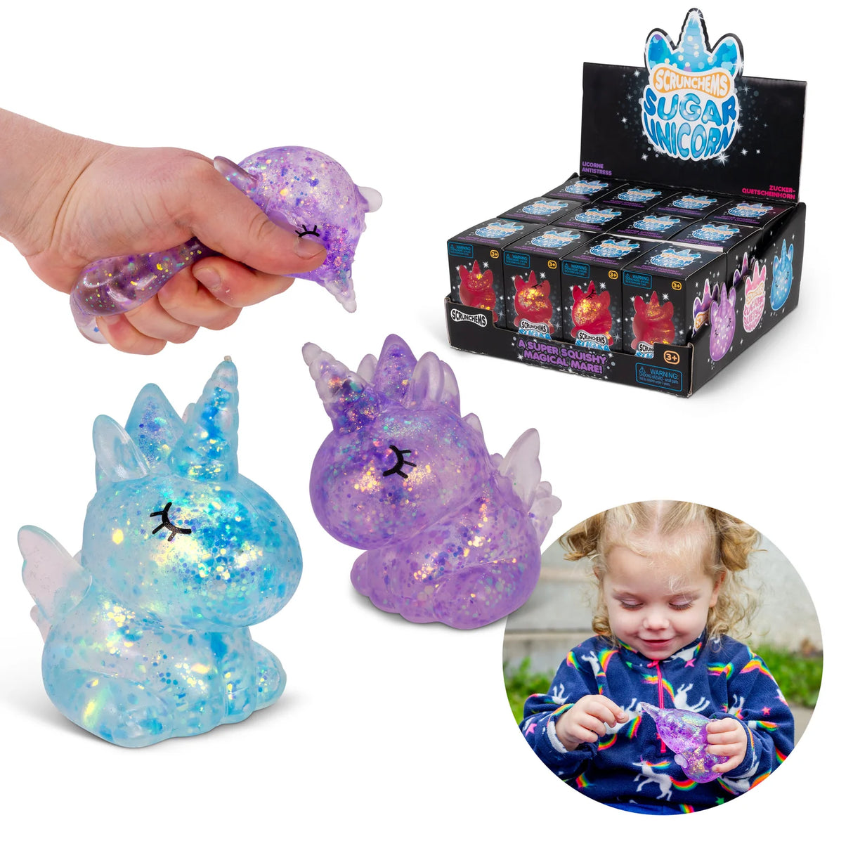 Blue and purple glitter Scrunchems Sugar Unicorn squishies shown with hand squeezing one and retail display box