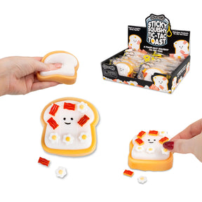 Scrunchems Tic-Tac Toast shown being squeezed, decorated with accessories, finger placing a piece, and retail display box