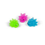 Three sea sheep glow-in-the-dark mini mochi squishies in green, pink and blue on white background