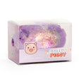 Purple glitter squishy pig toy in clear Sparkly Piggy branded packaging