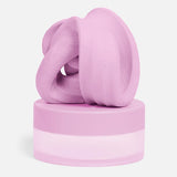 Blush pink focus putty folded on top of matching pastel pink storage jar