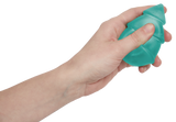 Hand holding a frosted green Speks Gump Christmas tree squishy, showing its palm-sized squeezable shape