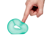 Sea Glass teal Speks Gump Loop stress ring pressed with finger, fidget toy
