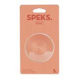 Speks slabs packaging with a circular design on an orange background